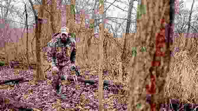 A Hunter Tracking A Wounded Deer In The Woods Guide To Tracking Wounded Deer