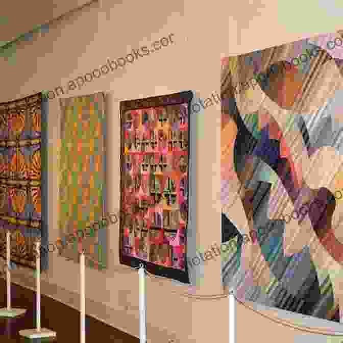 A Stunning Display Of Quilts Hanging In A Museum, Showcasing The Vibrant Colors And Intricate Patterns Of These Traditional Works Of Art. Quilts From Two Valleys: Amish Quilts From The Big Valley Mennonite Quilts From The Shenandoah Valley