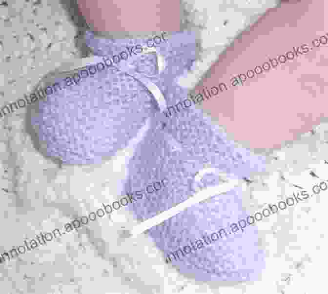 Adorable Baby Wearing The French Filigree Baby Booties French Filigree Baby Booties Knitting Pattern