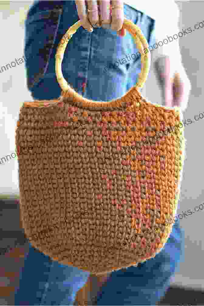 Crocheter Holding A Completed Crocheted Bag, Showcasing Its Intricate Details Simply Stunning Crocheted Bags Peggy Martin